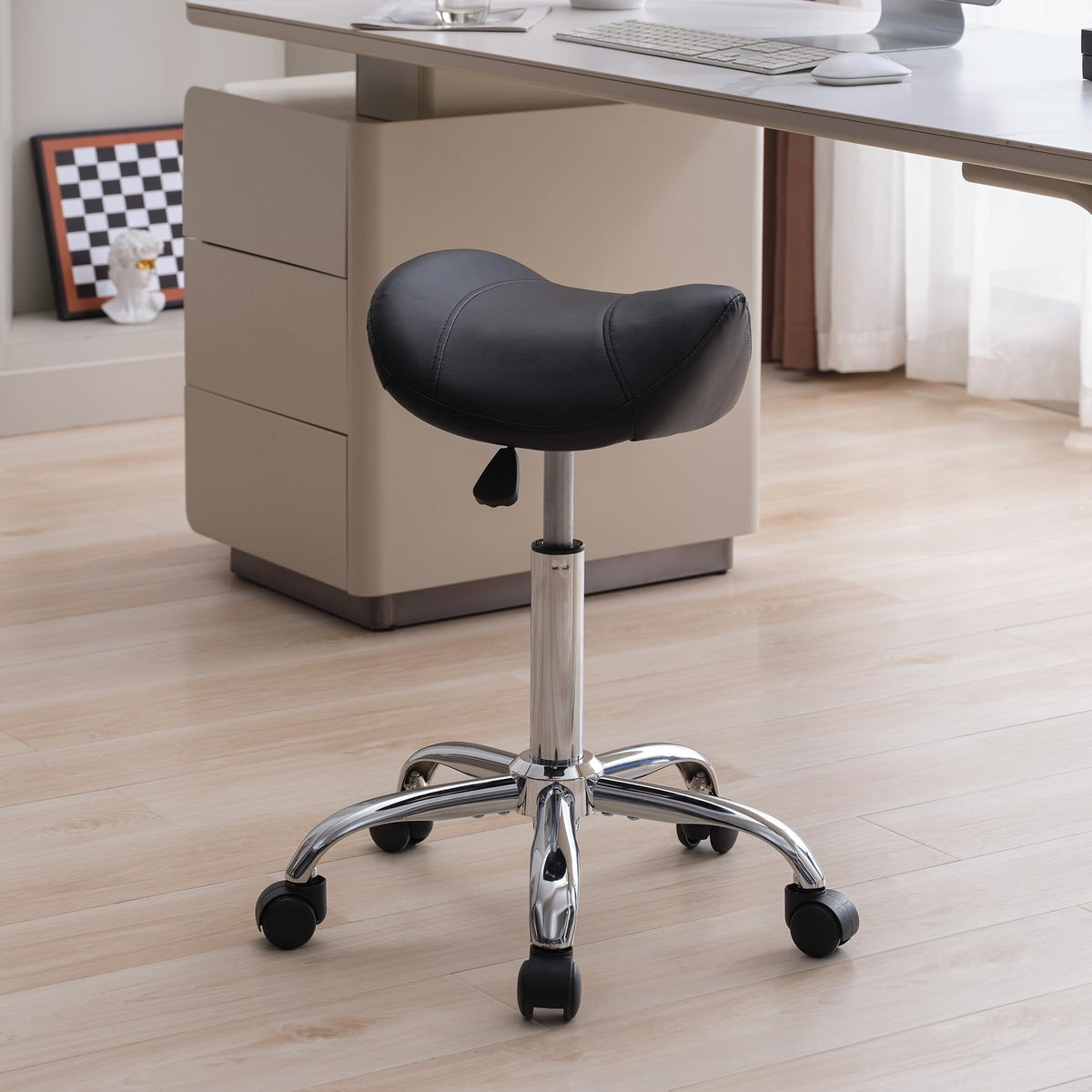 FIRAVOE saddle stool assembly shows easy setup and compact footprint.