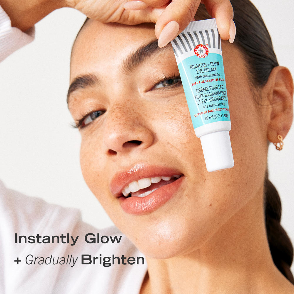 First Aid Beauty eye cream application close-up showing hydrated, brighter under-eye area