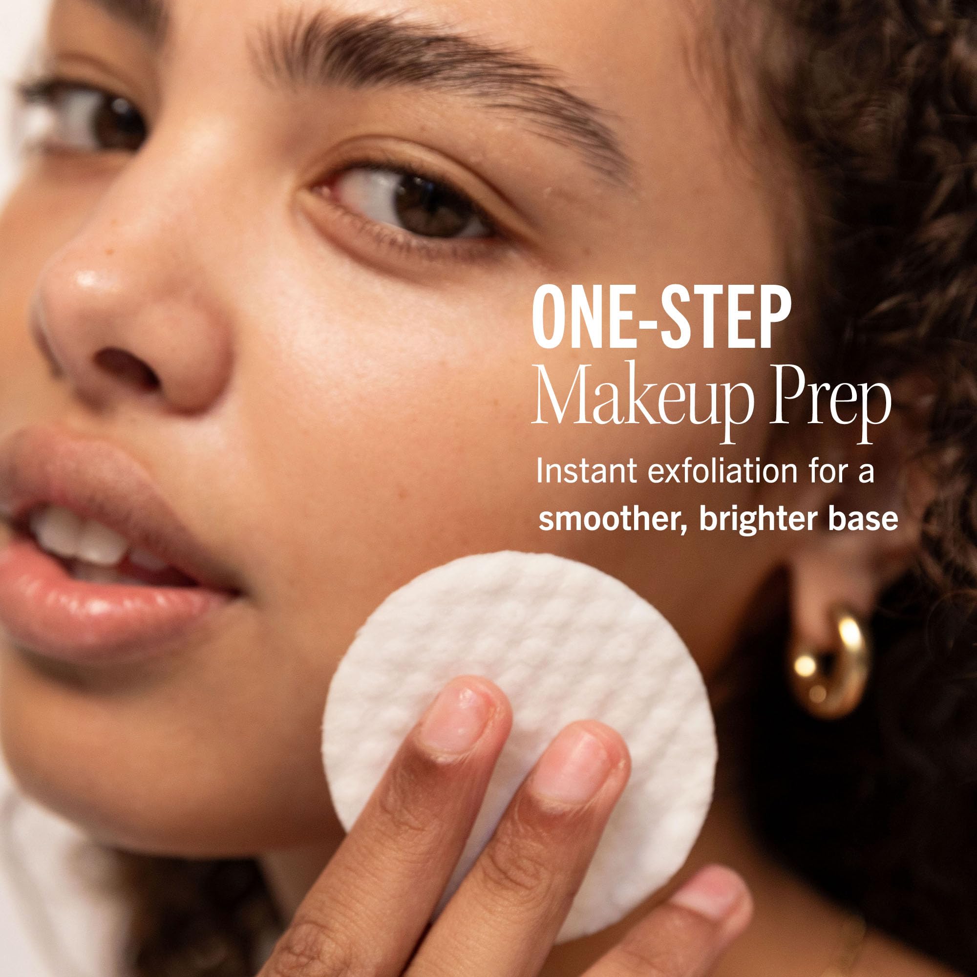 First Aid Beauty pads applied on skin for gentle toning and glow.