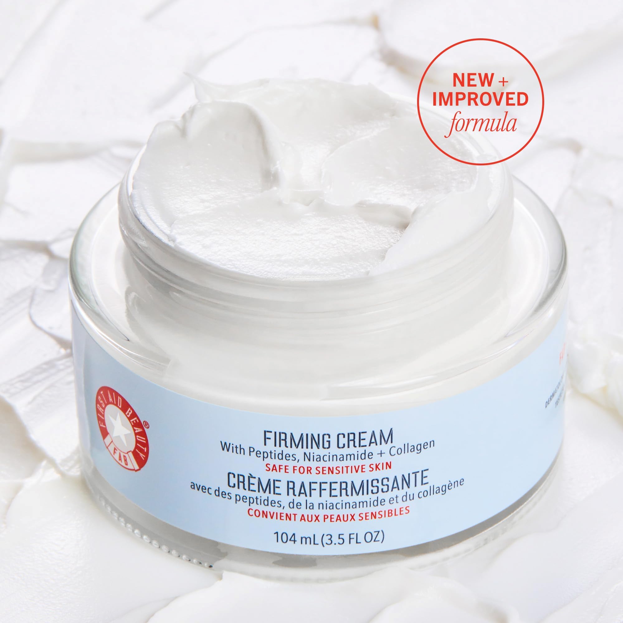 First Aid Beauty Firming Collagen Cream jar close-up demonstrates creamy texture