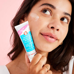 First Aid Beauty Hello FAB coconut skin smoothie application swipe demonstrates dual hydration and makeup grip.