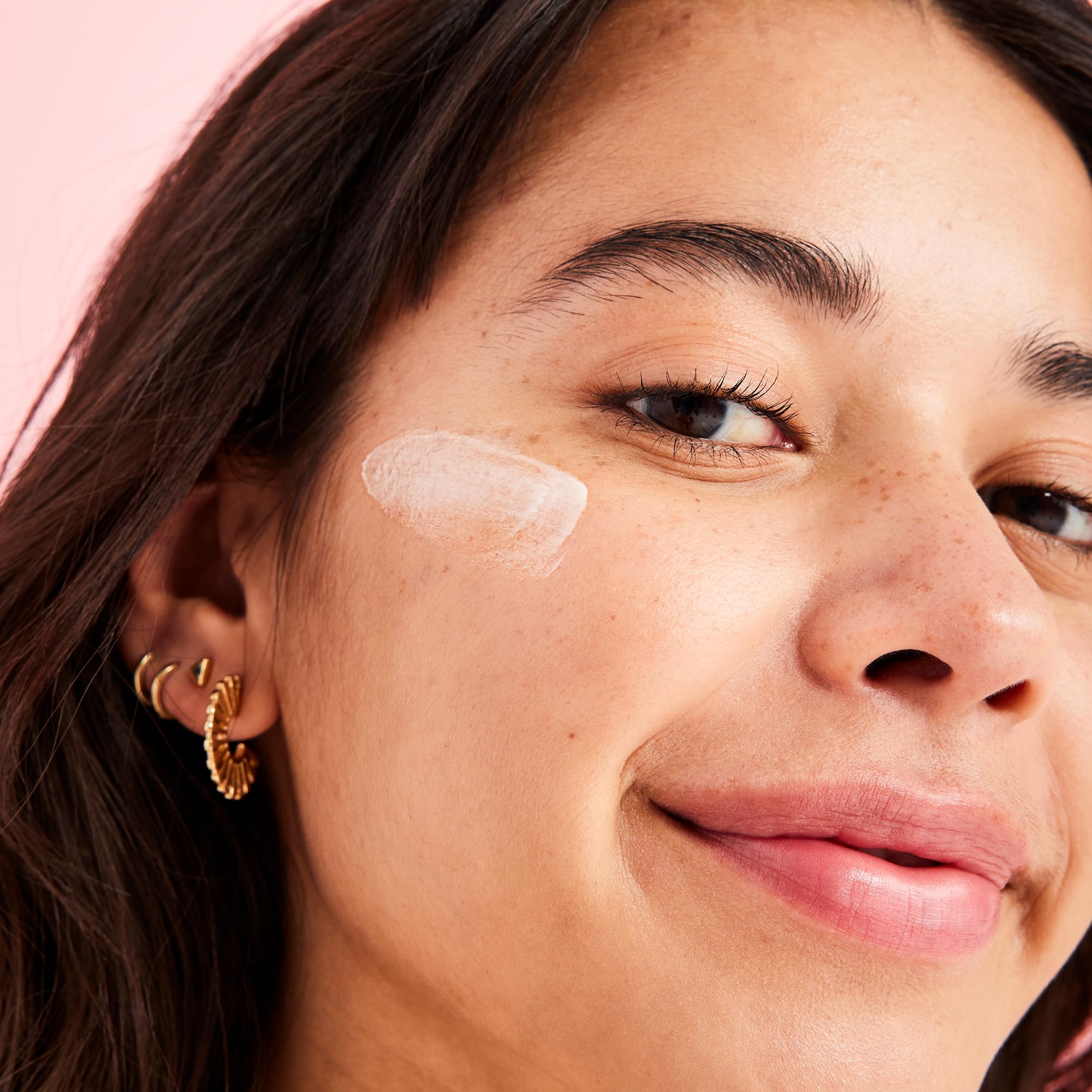 First Aid Beauty Hello FAB texture closeup showcases micro-pearls for radiant blur and pore reduction.