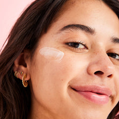 First Aid Beauty Hello FAB texture closeup showcases micro-pearls for radiant blur and pore reduction.