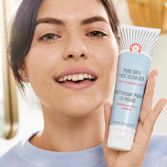 First Aid Beauty Pure Skin Face Cleanser texture closeup, gentle gel formula.