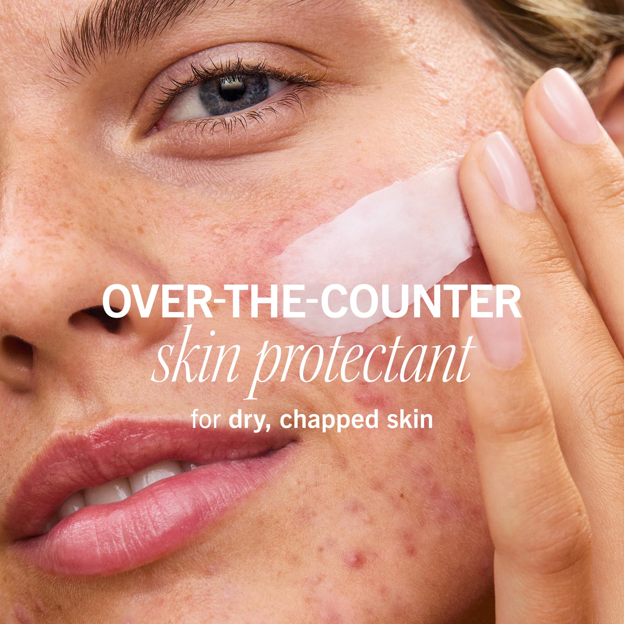 First Aid Beauty barrier balm being applied on fingertip for targeted moisture.