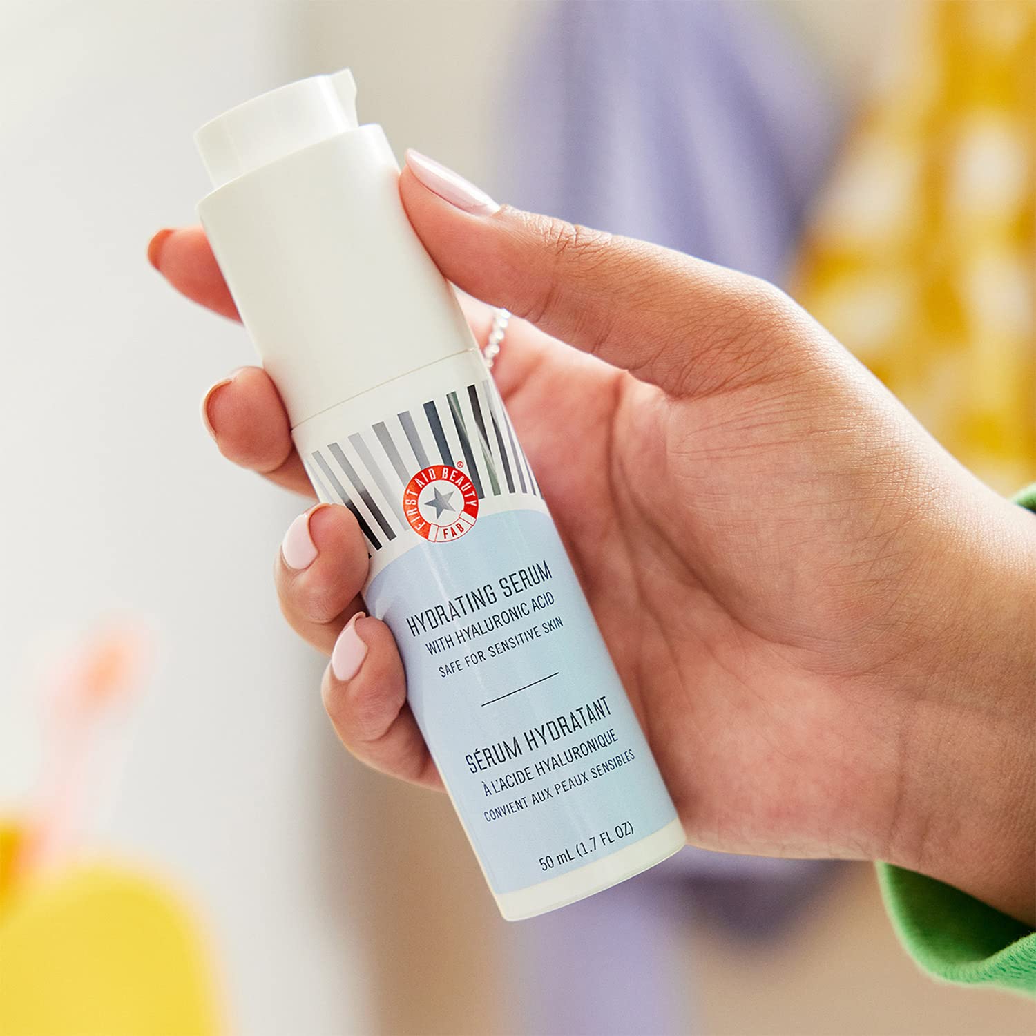 First Aid Beauty hydrating serum packaging tube on clean surface