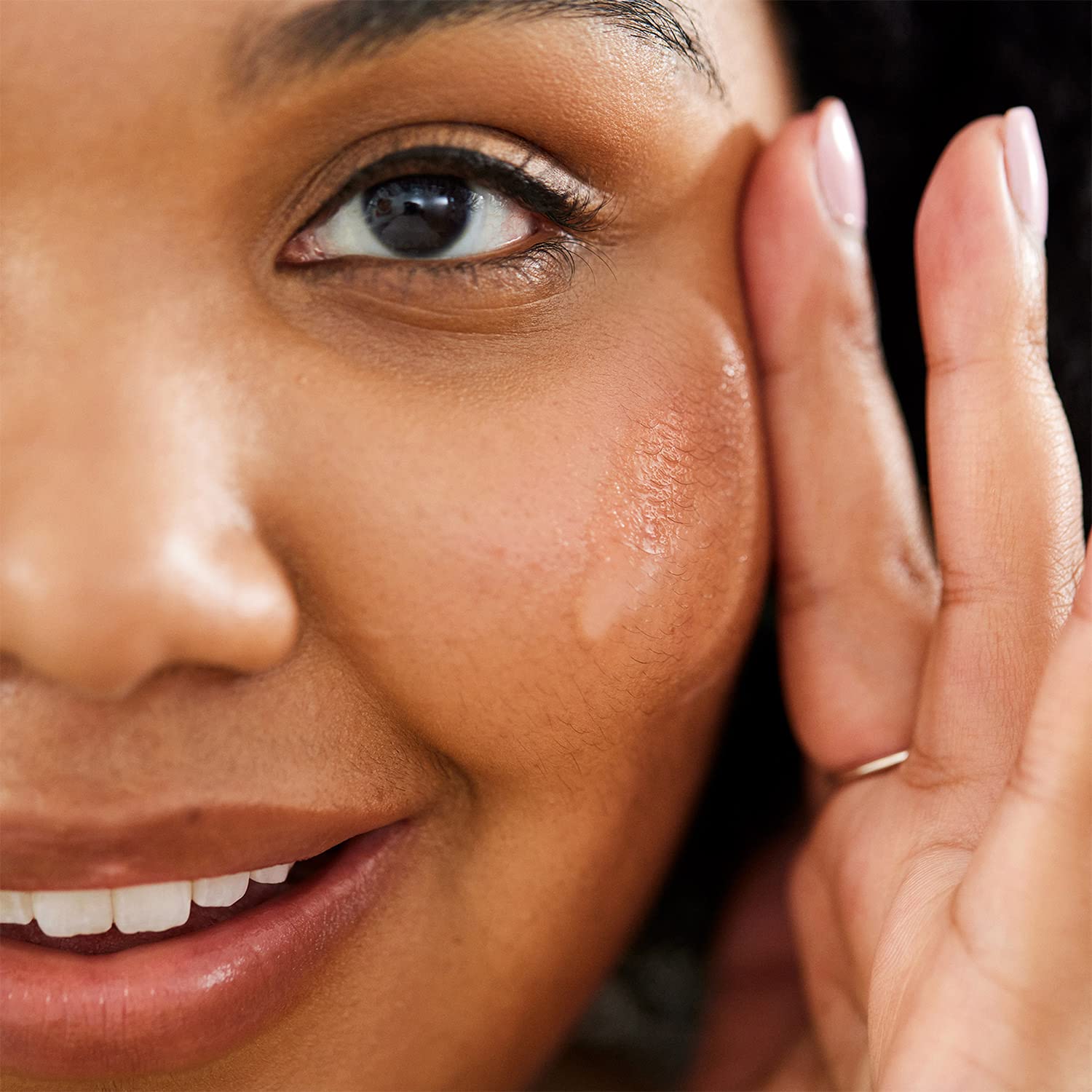 First Aid Beauty hydration glow on skin after application, dewy finish