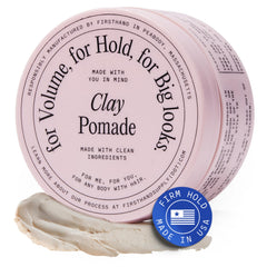 Firsthand Supply Hair Clay Pomade jar closeup showing matte finish and strong hold.