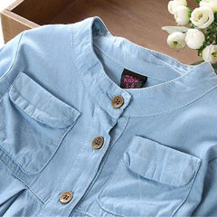 Flashing Boy pocket-detail blue top, handy pockets for tiny treasures.