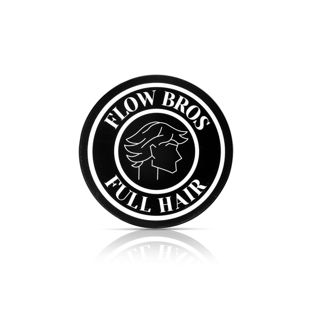Flow Bros hair clay packaging close-up for premium styling and grip