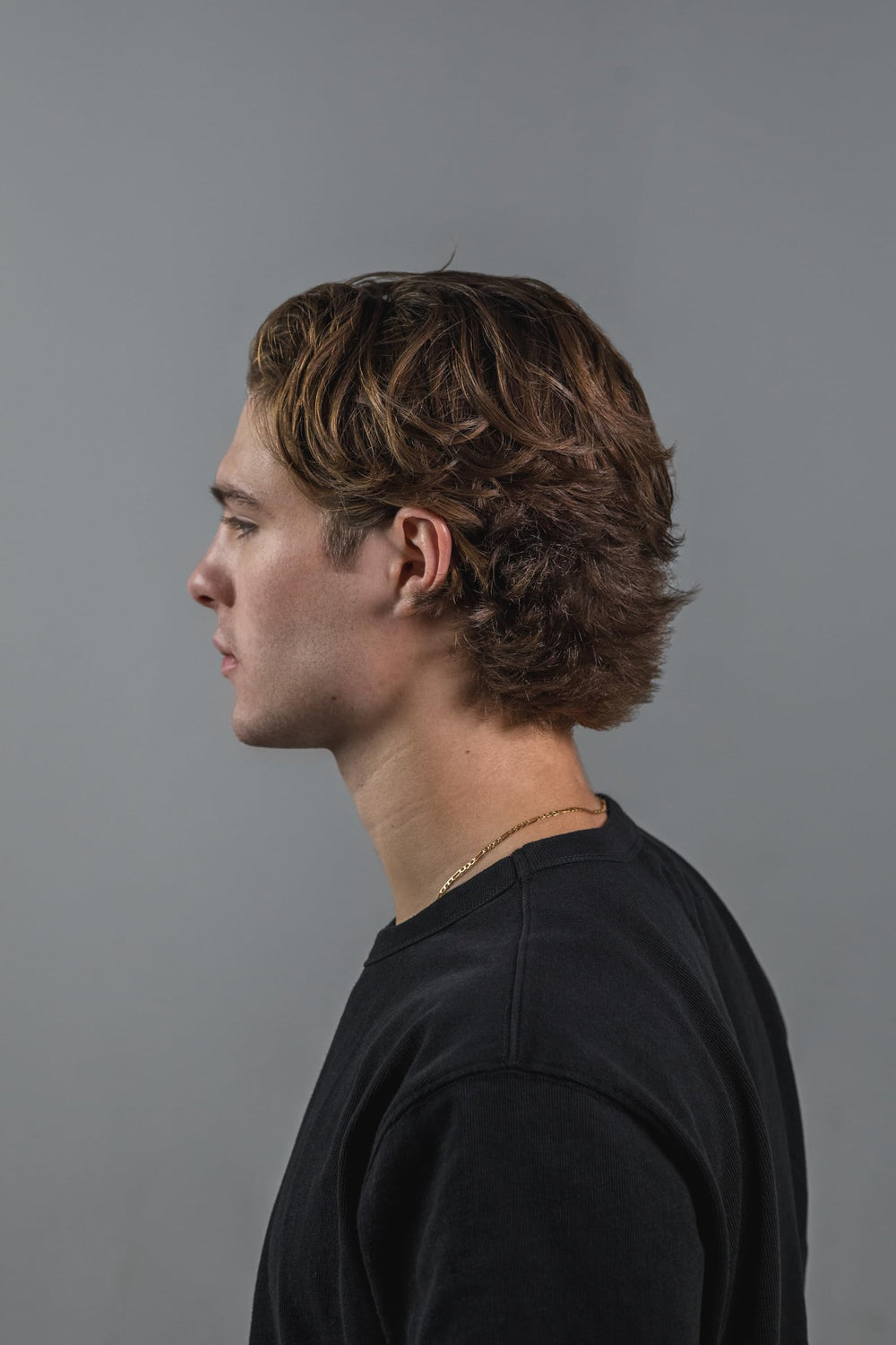Flow Bros hair clay on textured hair for added volume