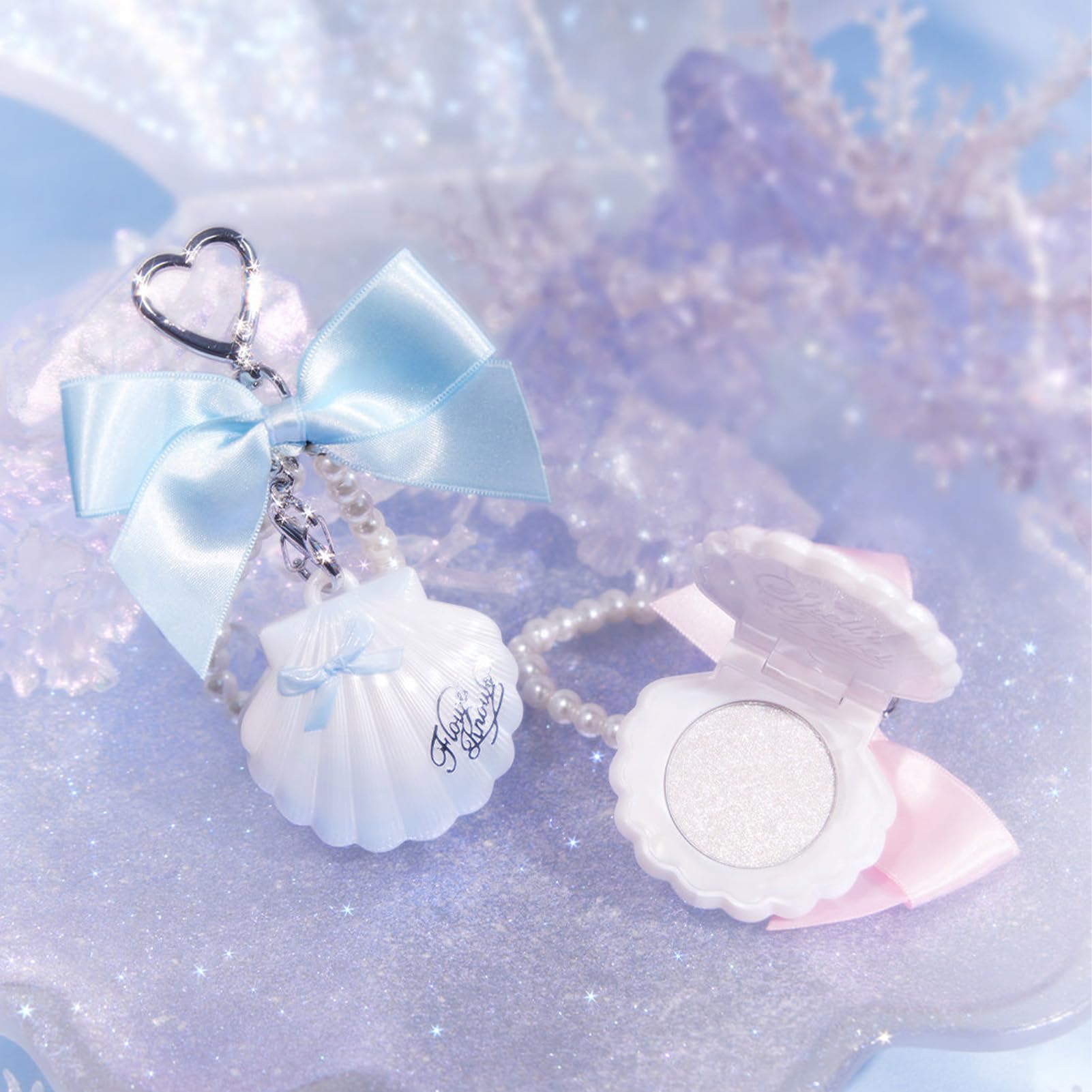 Flower Knows Blue Tears sapphire shimmer brightens cheeks with iridescent glow.