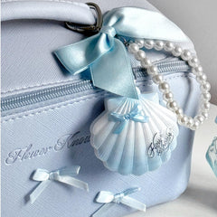 Flower Knows Glitter Pearly Highlighter Balm application swirls for a soft shimmer.