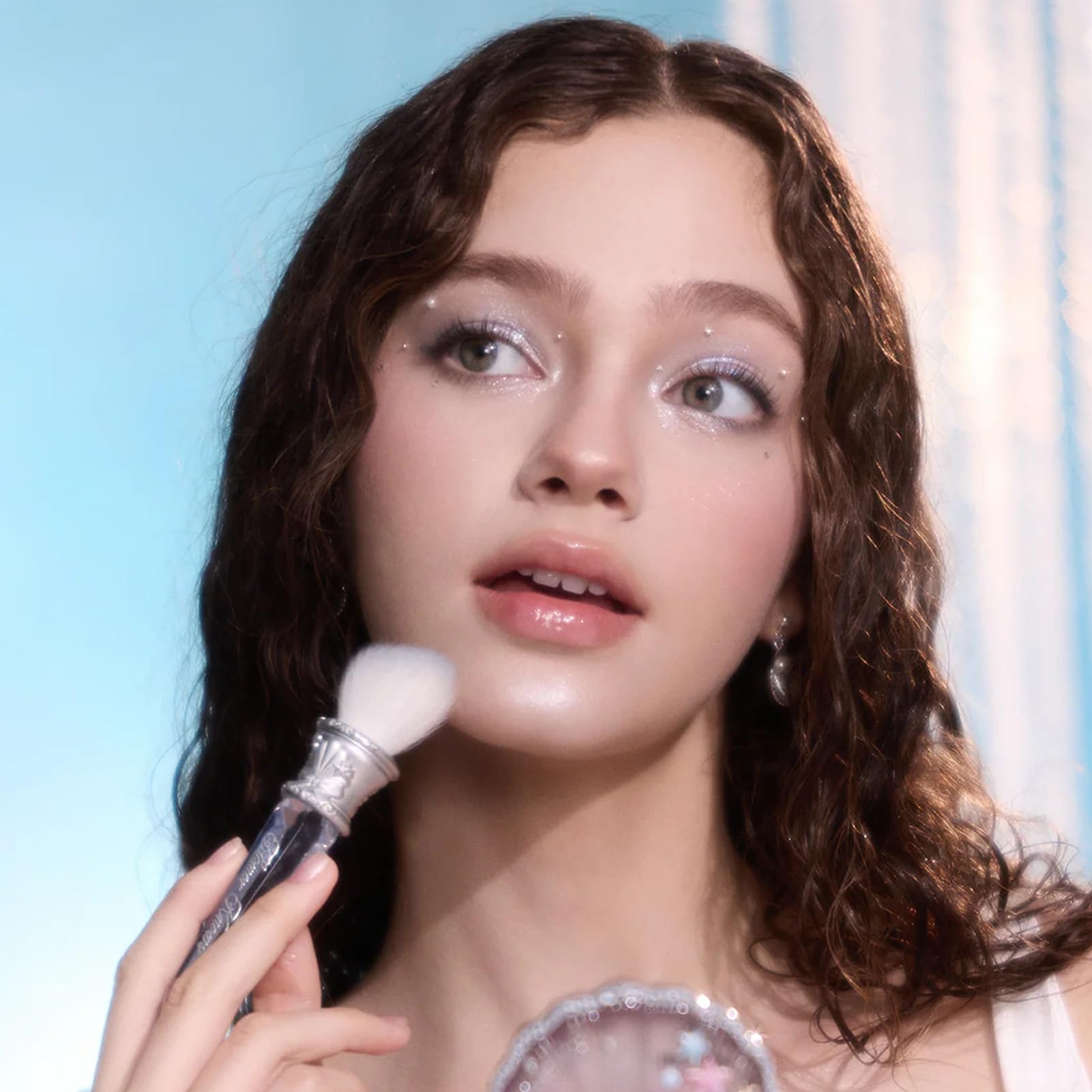 Flower Knows Shell's Jewel Angled Brush delivers porcelain-skin glow with dehydrated powders.