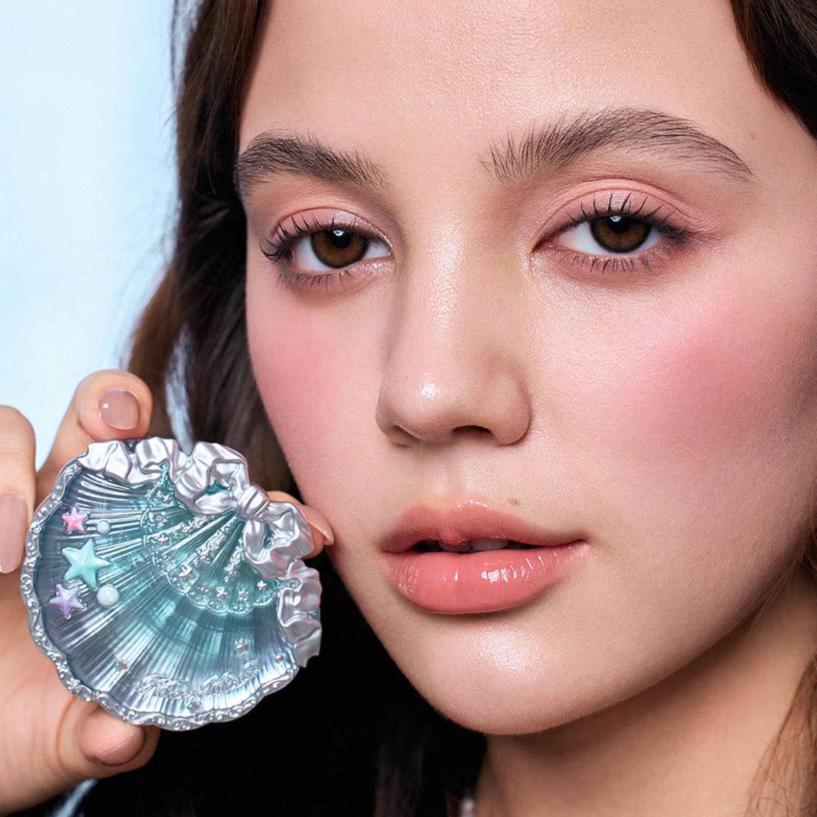 Flower Knows Shells Jewel Hair Clip secures styles with a delicate decorative touch.