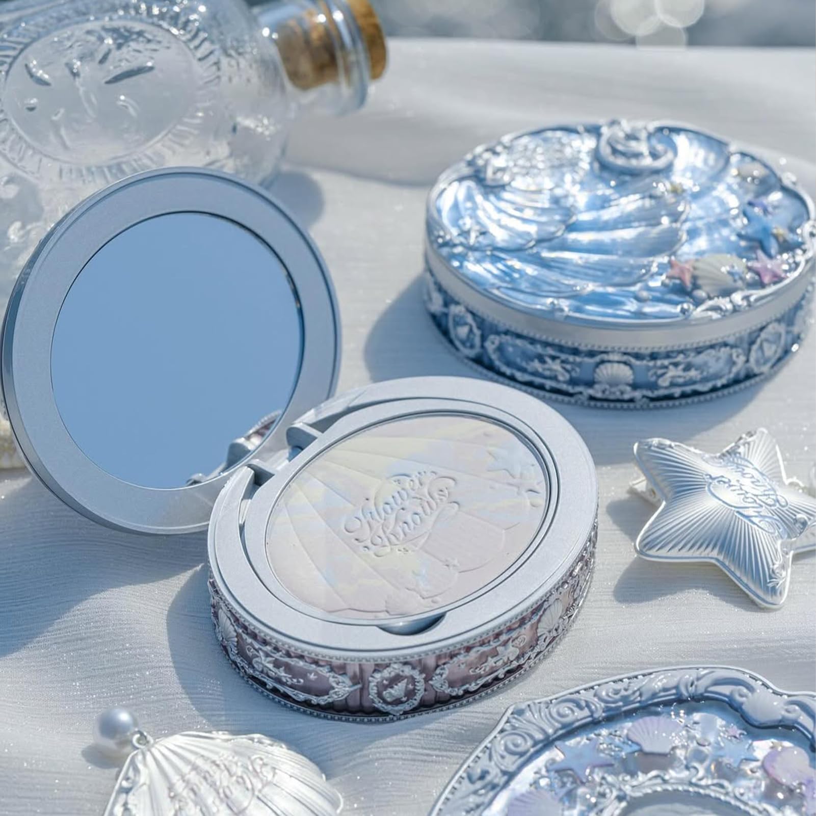 Flower Knows Shell's Jewel marbled powder blends for natural coverage and blur.