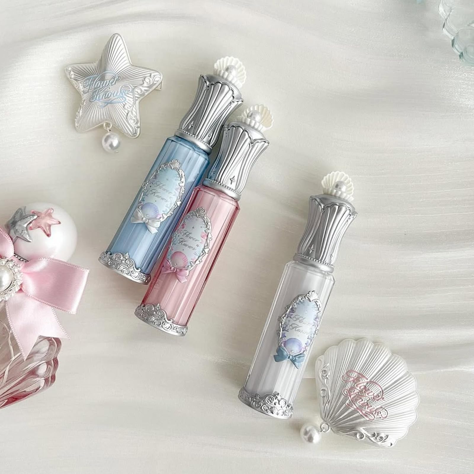 Flower Knows Shell's Jewel Nourishing Lip Glaze 95 percent beneficial ingredients packaging close-up