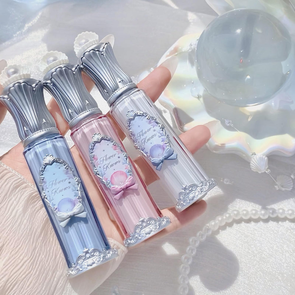 Flower Knows Shell's Jewel Nourishing Lip Glaze travel-friendly tube ready for touch-ups