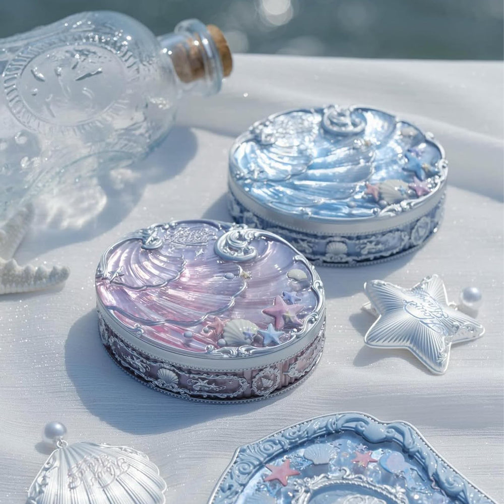 Flower Knows Shell's Jewel shade 01 Cloudy Blue enhances neutral-toned skin with soft radiance.