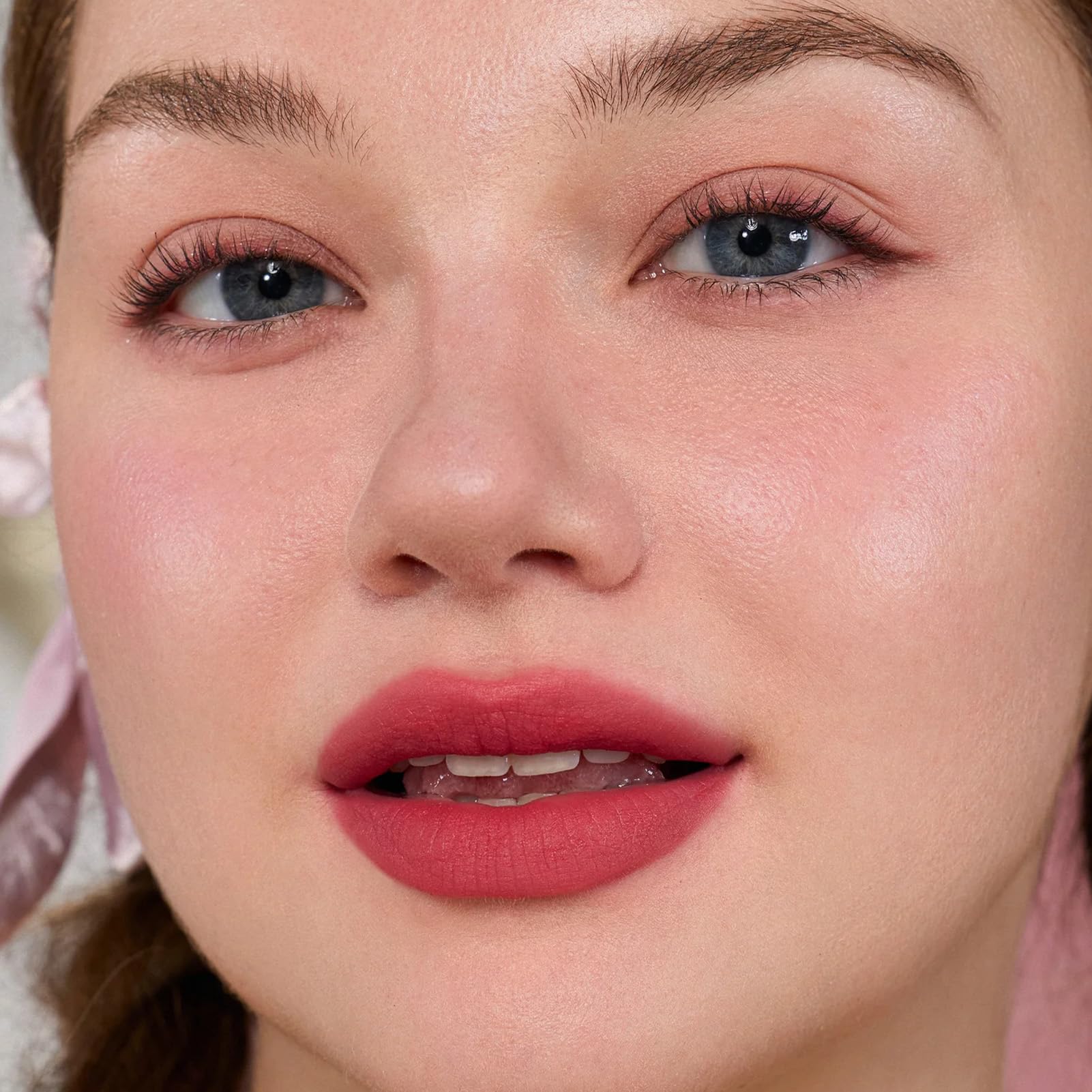 Flower Knows lip cream smooths lines for a refined, fuller-looking smile.