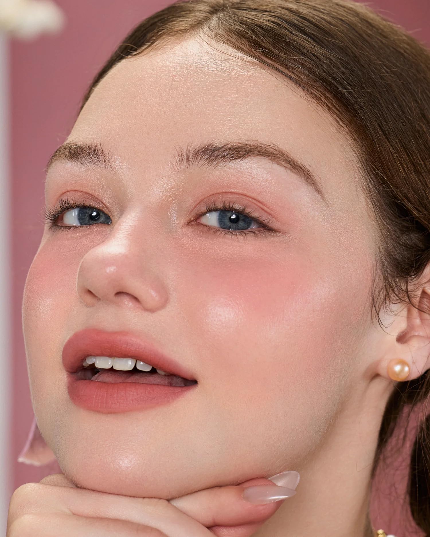 Flower Knows Strawberry Cupid Liquid Blush 04 Apple Glow swatch delivers warm coral radiance.