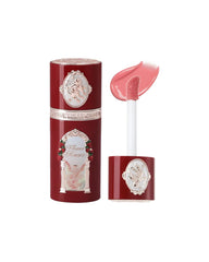 Flower Knows Strawberry Cupid Liquid Blush bottle pour reveals a dewy coral pink glow.