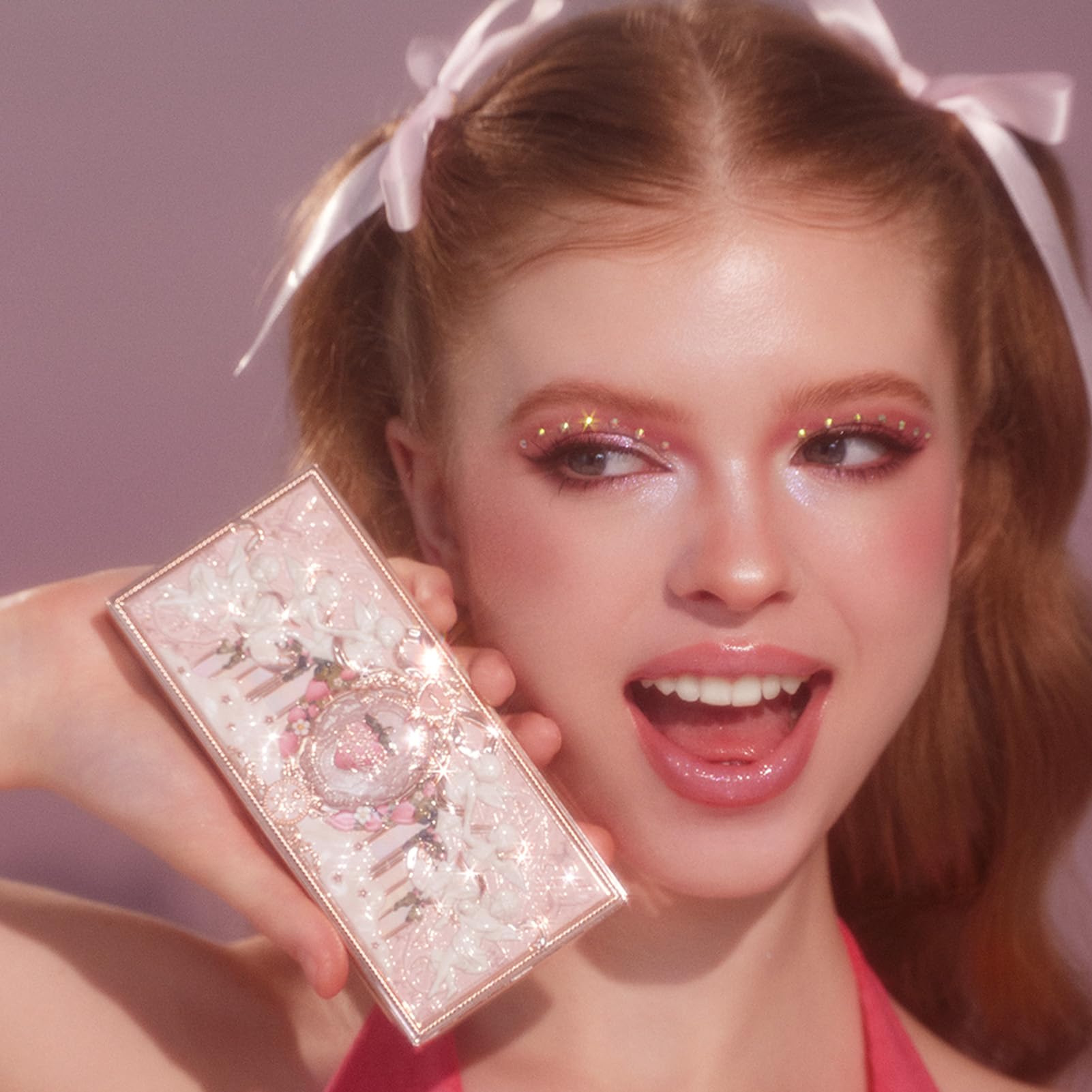 Flower Knows Strawberry Cupid Palette compact on desk highlights travel-friendly design