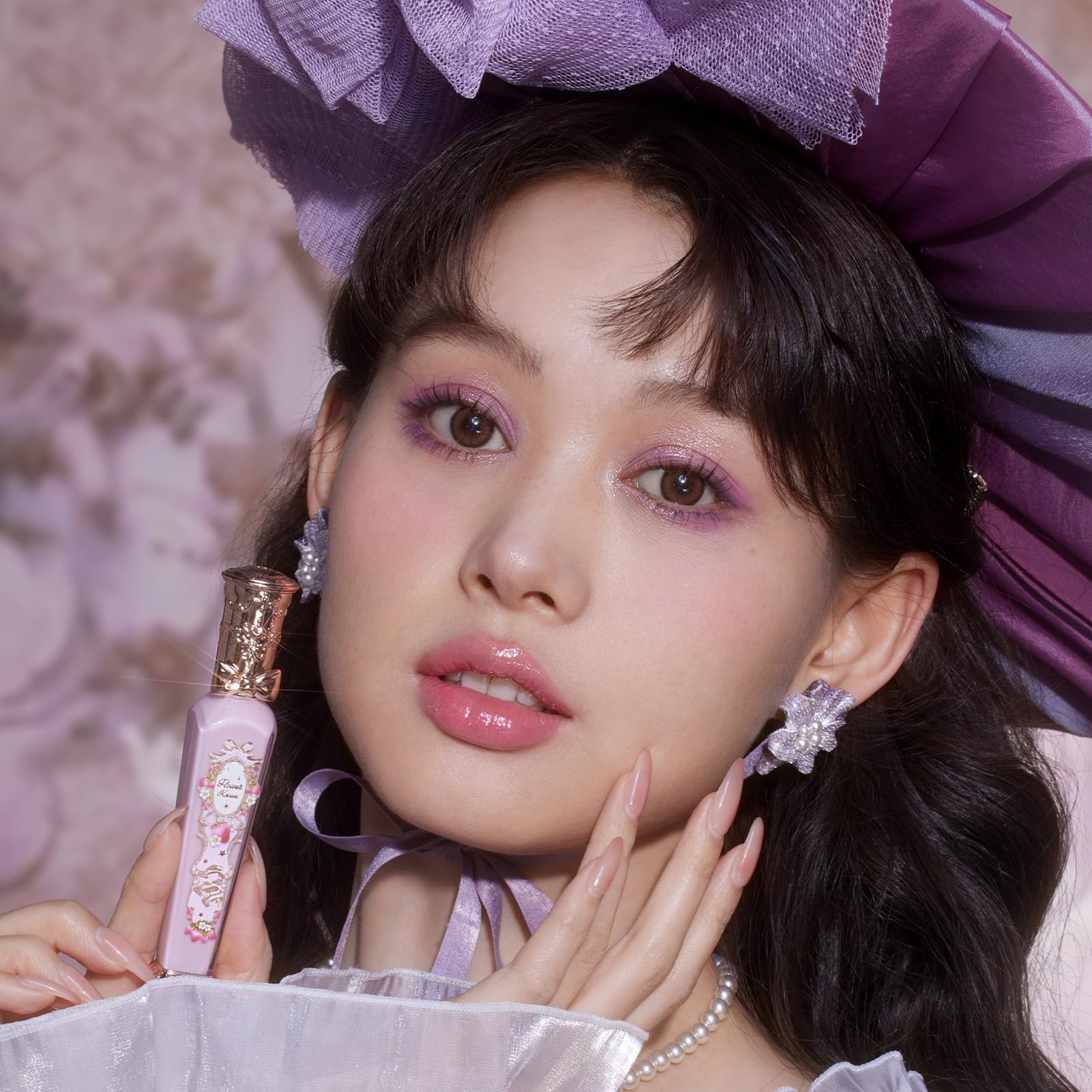 Flower Knows Violet Strawberry Rococo Glowy Lip Gloss gift-ready packaging on shelf.