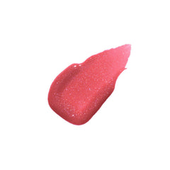 Flower Knows lip gloss swatch showing raspberry pink sparkle and high-shine finish