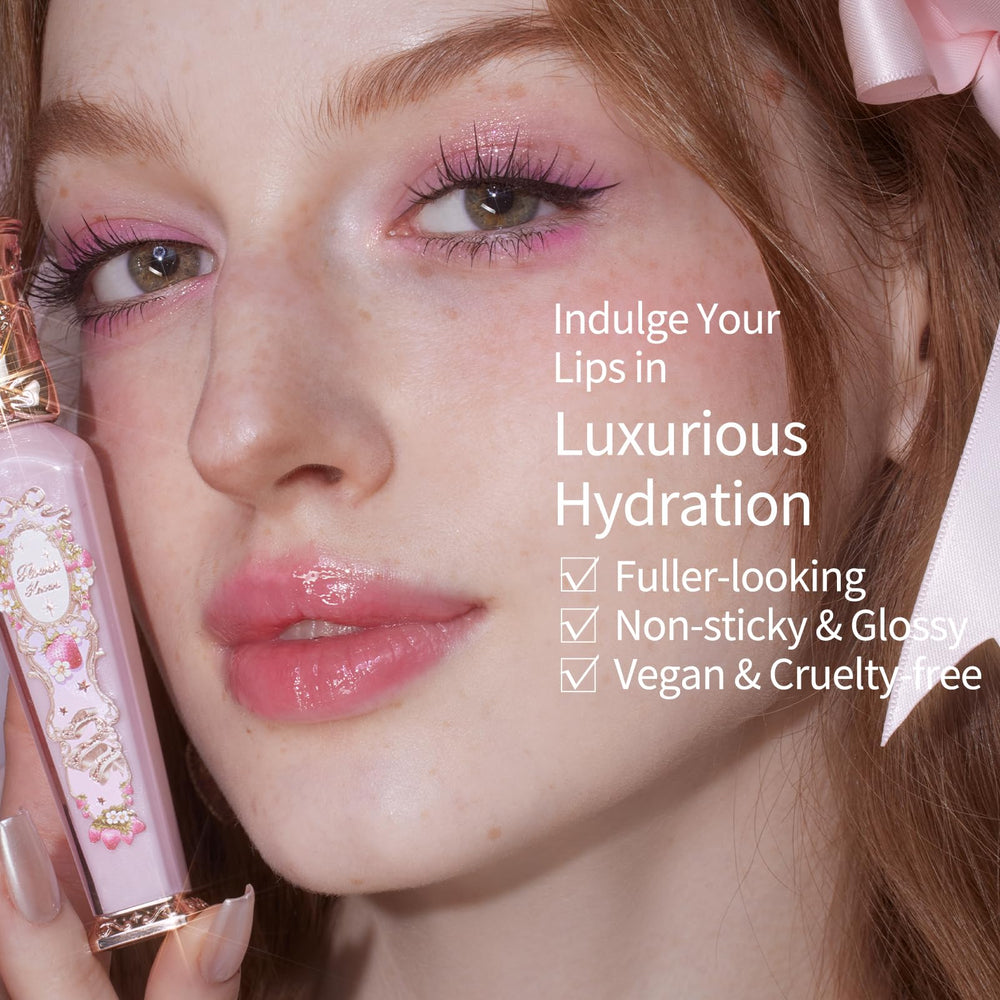 Flower Knows Violet Strawberry Rococo Glowy Lip Gloss vanity display with glossy bottle.
