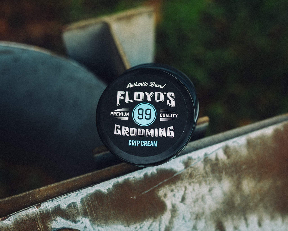 Floyd's 99 Grip Cream packaging closeup highlights travel-friendly design.