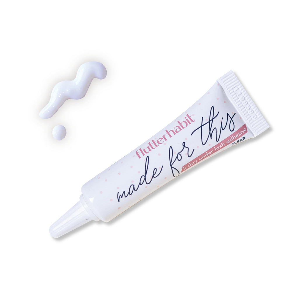 FlutterHabit Made for This adhesive bottle closeup shows clear formula with strong hold.