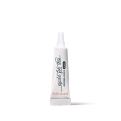 FlutterHabit Made for This adhesive bottle closeup shows strong hold for all-day wear