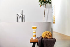 Forever Living Aloe Propolis Creme swatch on arm highlights smooth texture and comfort.
