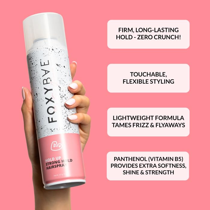 FoxyBae Hair Spray label detail shows biotin and meadowfoamate.