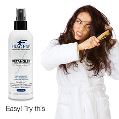 FRAGFRE detangler spray mist on hair demonstrating smooth, knot-free styling.