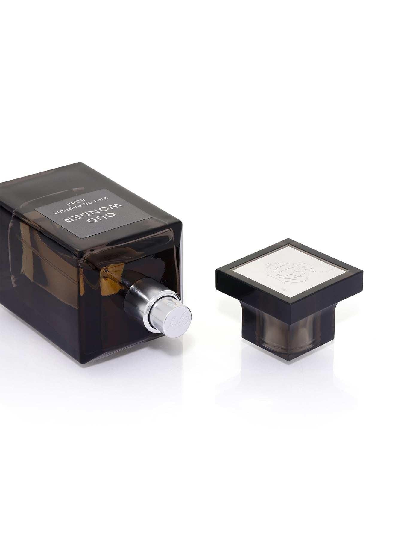 Fragrance World Oud Wonder applied to pulse points for lasting presence.