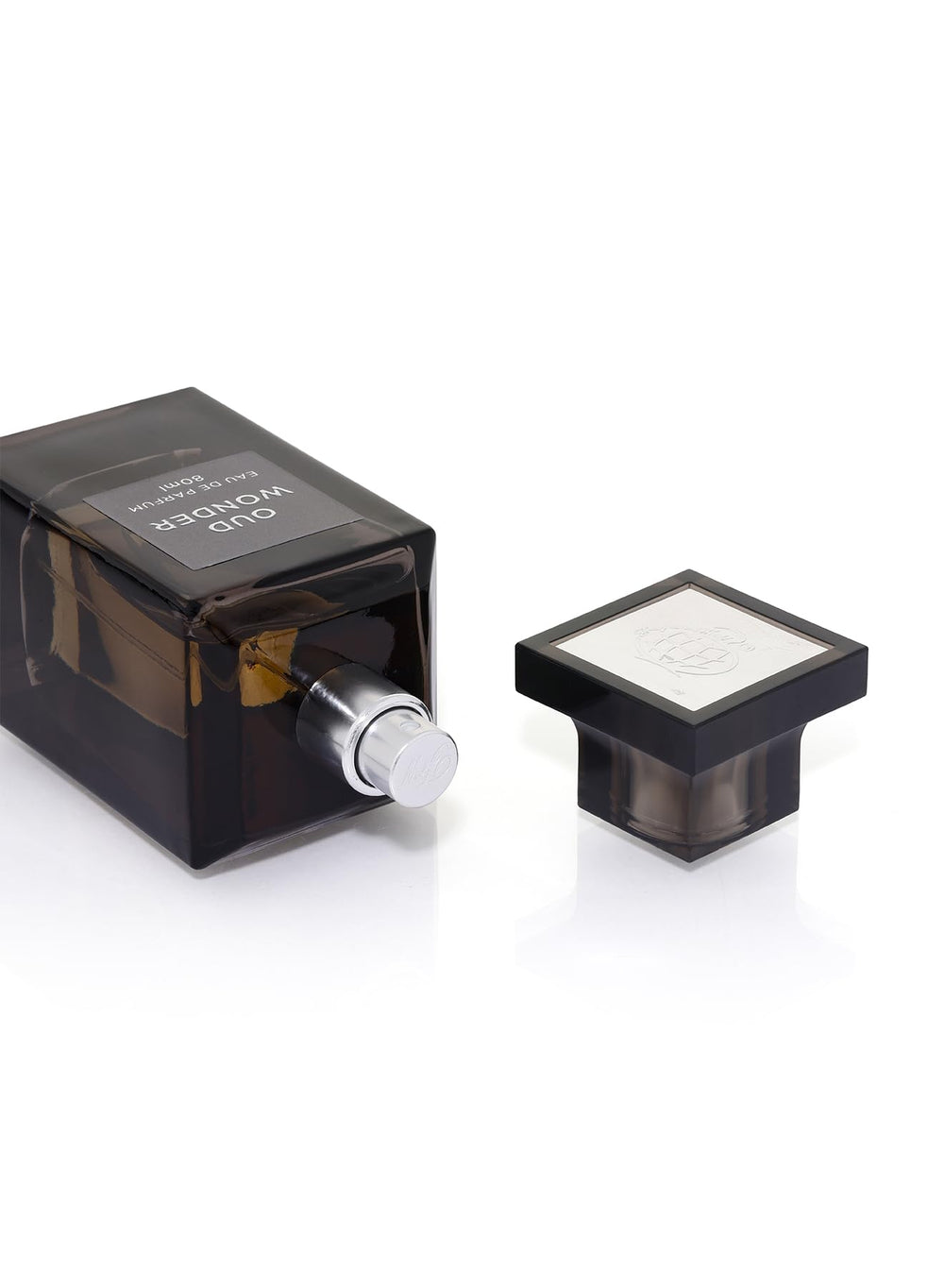 Fragrance World Oud Wonder applied to pulse points for lasting presence.