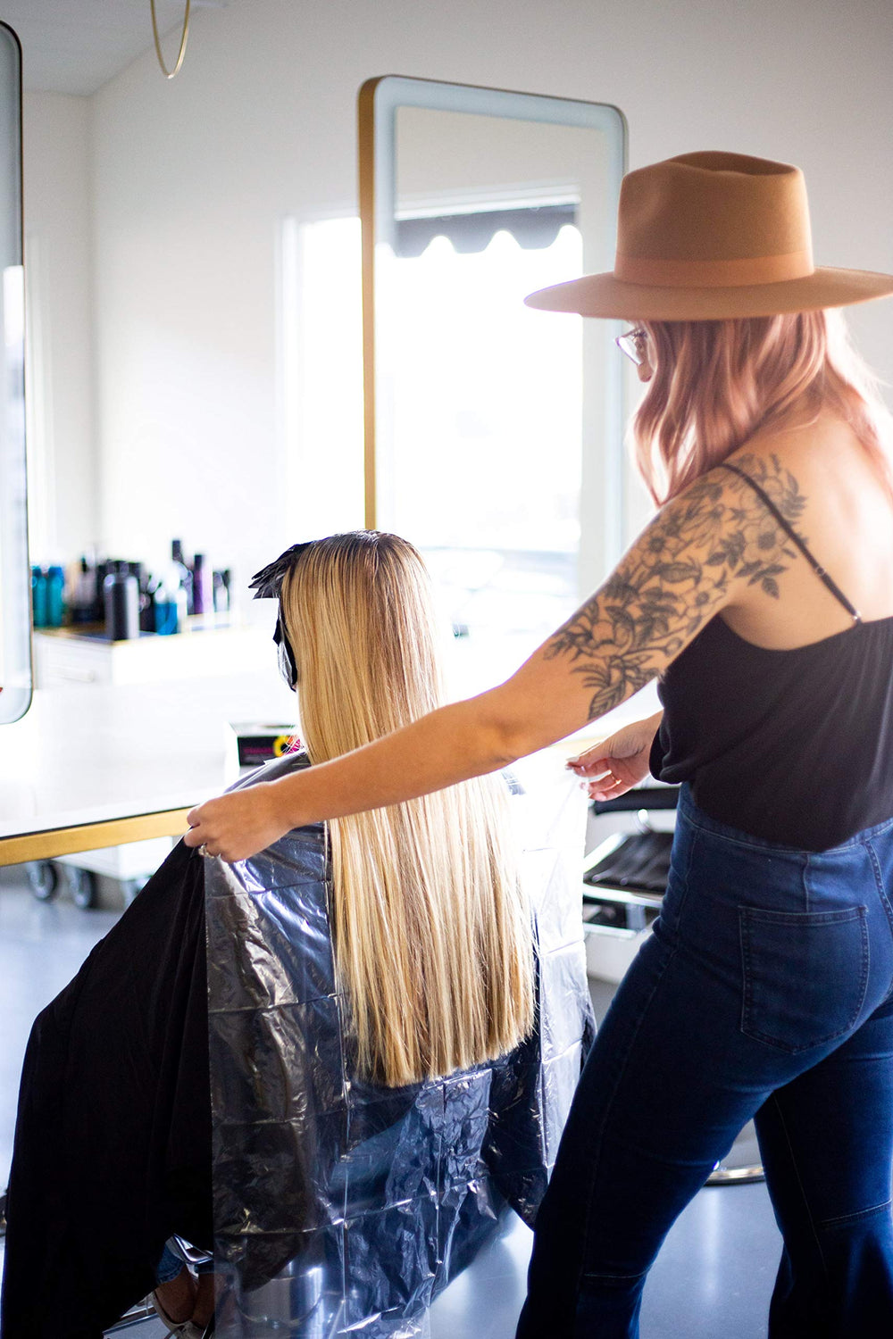 FRAMAR backwards bib in use during a hair-dye session.