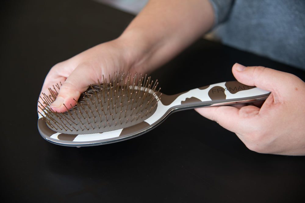 FRAMAR cow-print detangler in wet hair for tangle-free styling