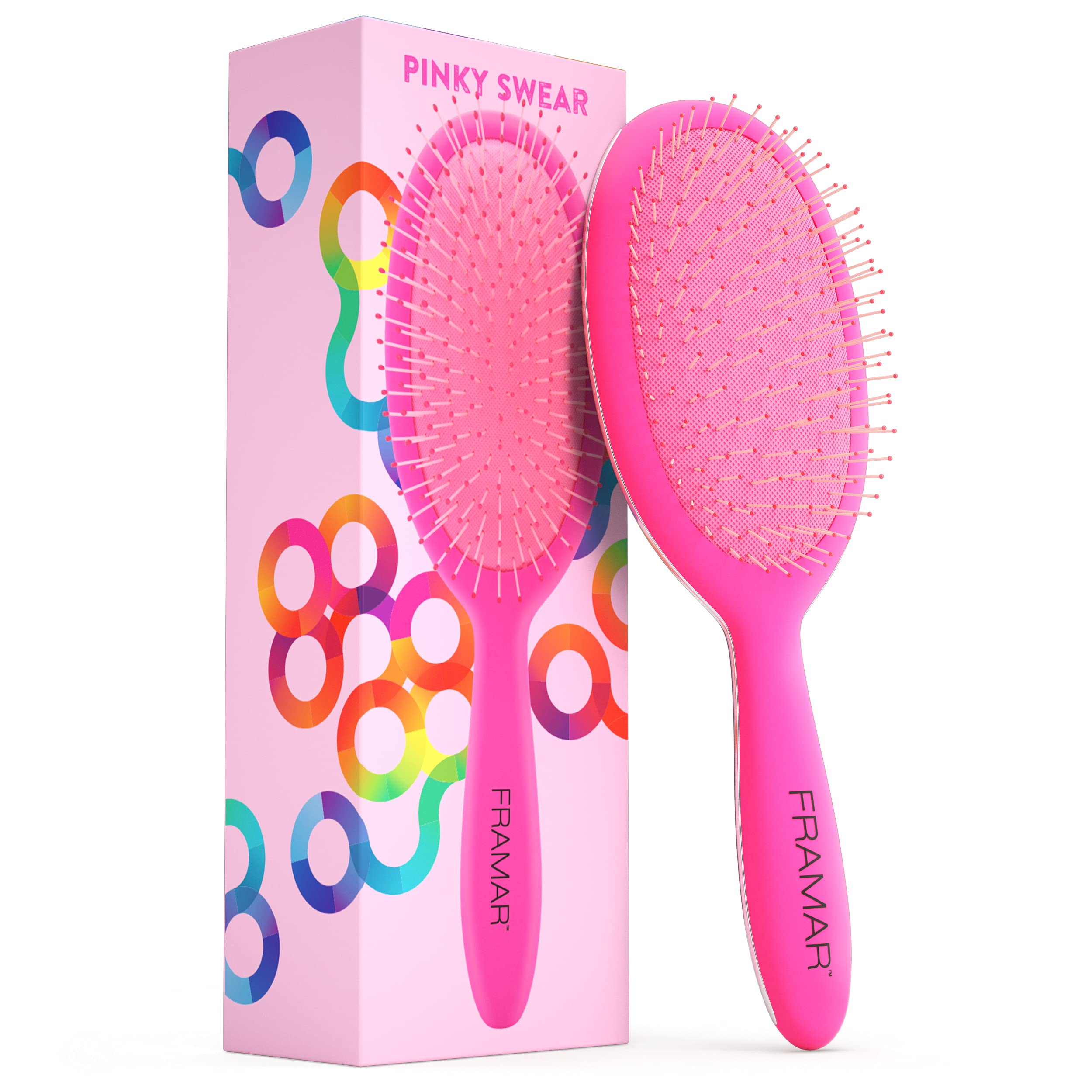 FRAMAR Detangling Brush pink-handle eases knots across all hair types.