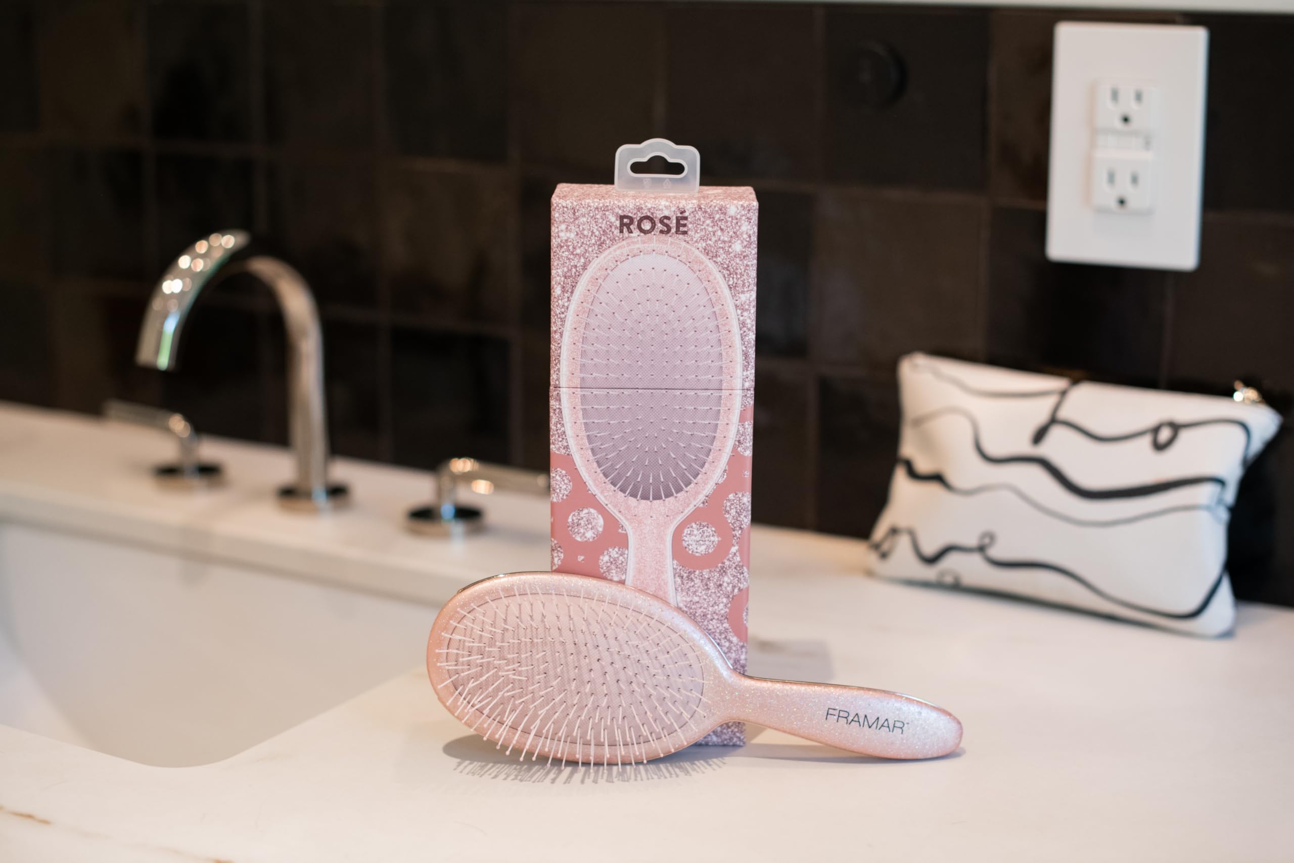 FRAMAR Glitter Hair Brush Detangler packaging-shot suggests gift-ready glam.