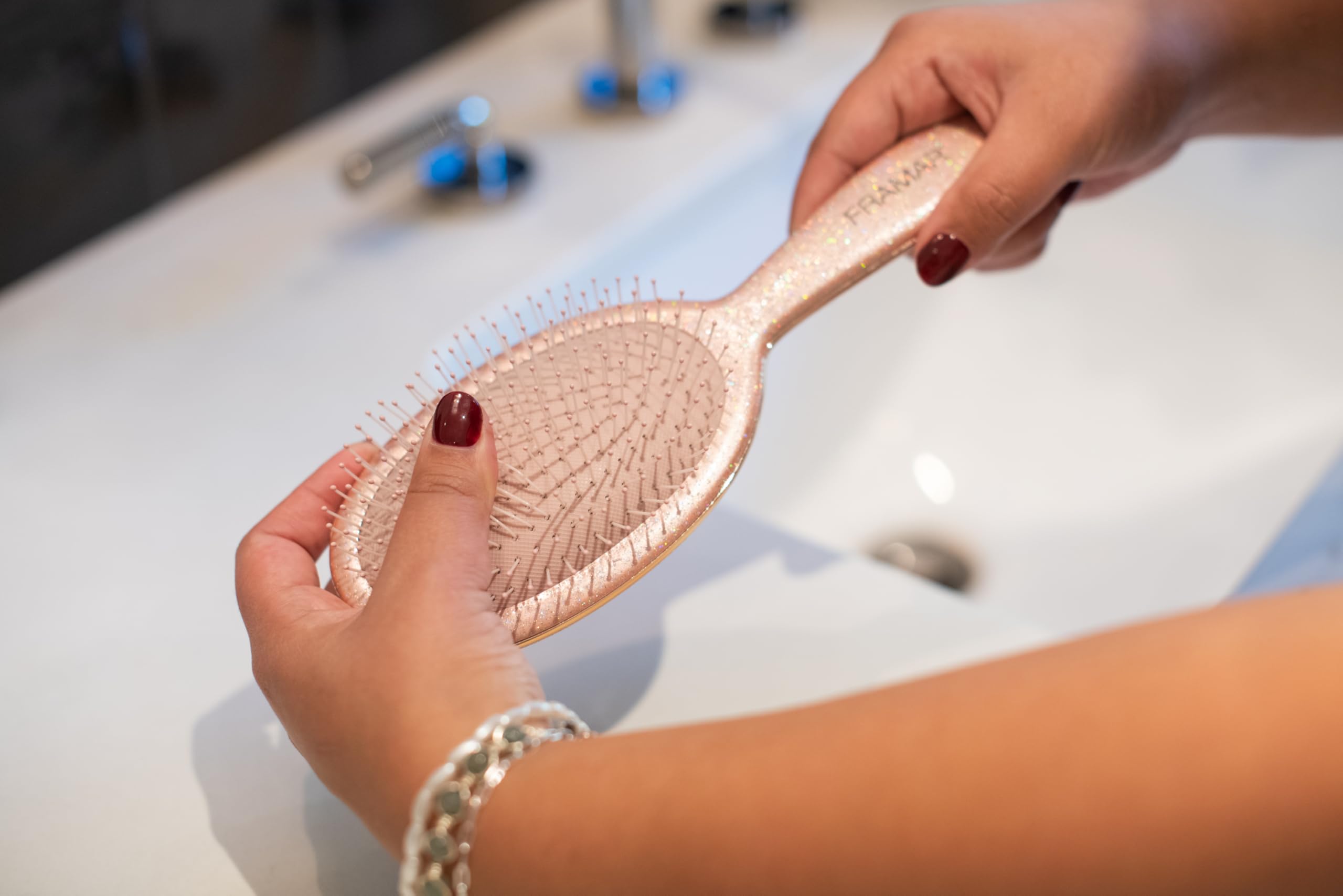 FRAMAR Glitter Hair Brush Detangler soft-bristles closeup indicates gentle detangling and reduced pulling.