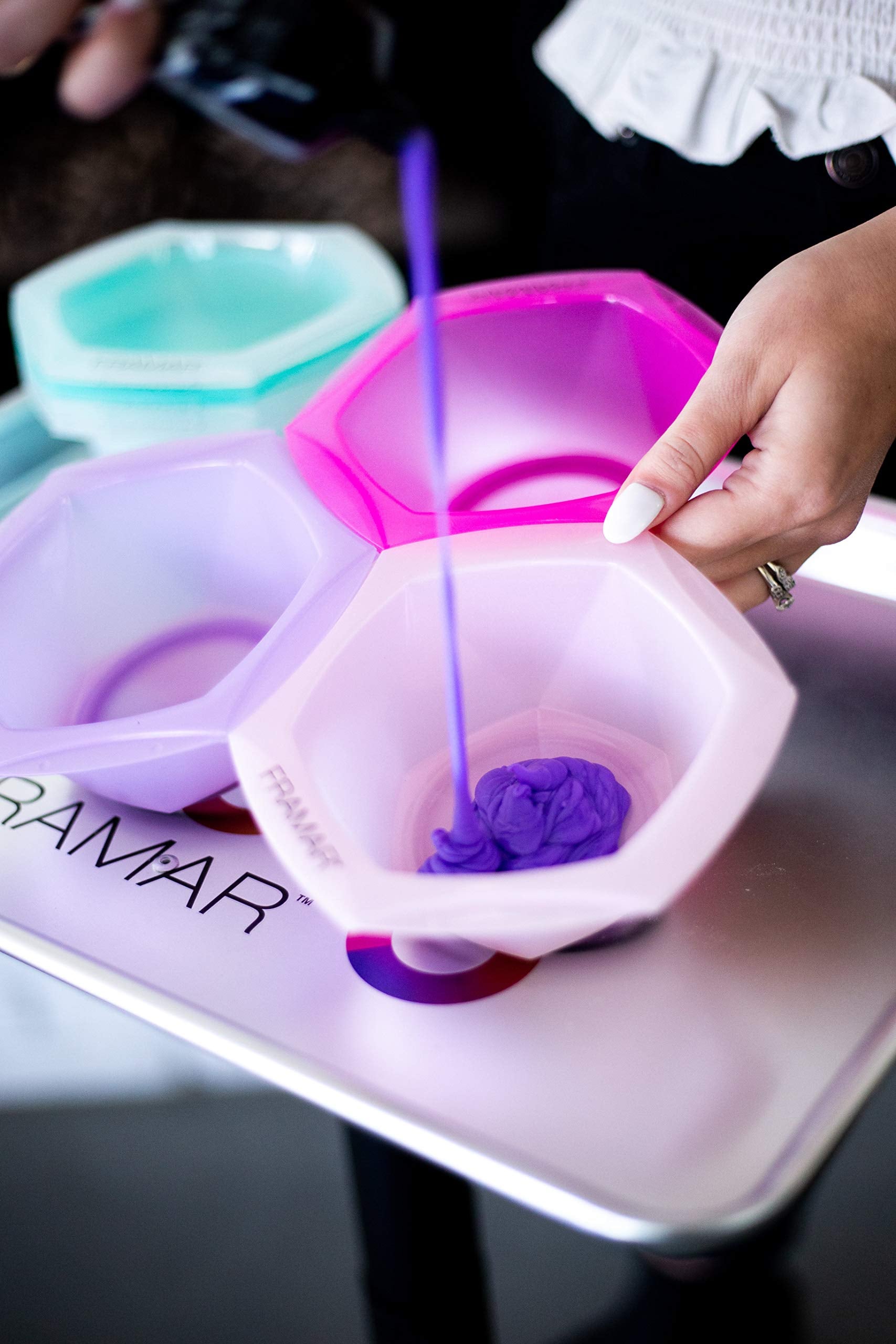 FRAMAR portable professional bowls for on-the-go coloring.