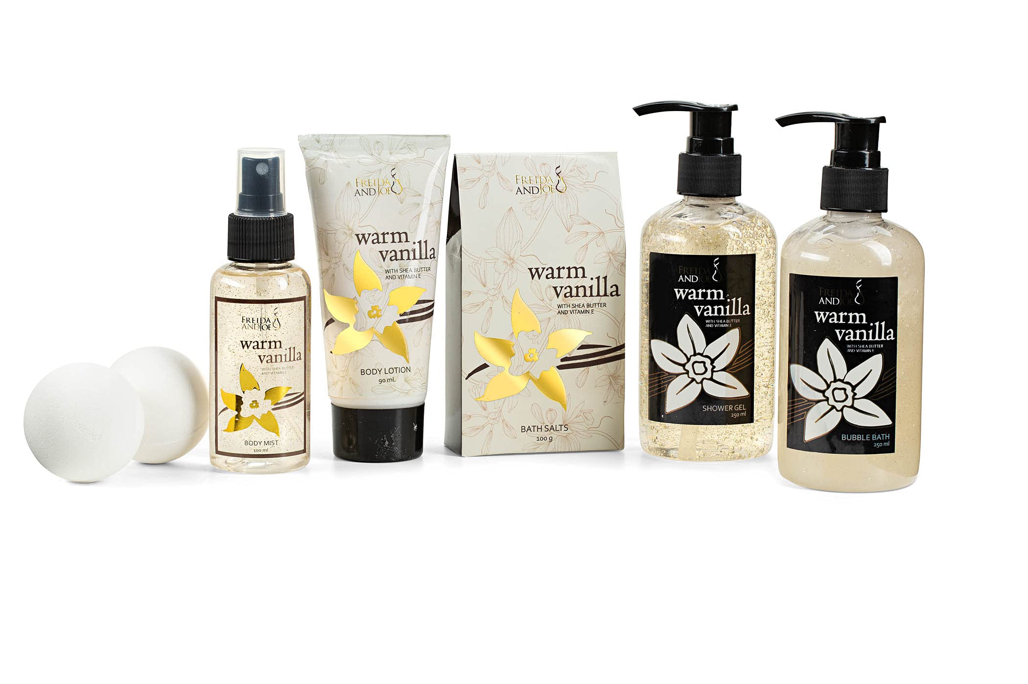 Freida and Joe Warm Vanilla spa set flatlay highlights luxurious shower and bubble bath for home spa moments.