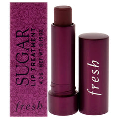 Fresh Sugar Lip Treatment Berry tube close-up shows sheer color and hydration.