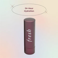 Fresh Sugar Lip Treatment Plum closeup highlights nourishing, buttery texture.