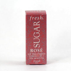 Fresh Sugar Lip Treatment Rose ingredient blend closeup emphasizes nourishing oils.