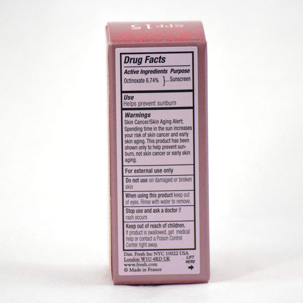 Fresh Sugar Lip Treatment Rose on lips shows natural tint and sheen.