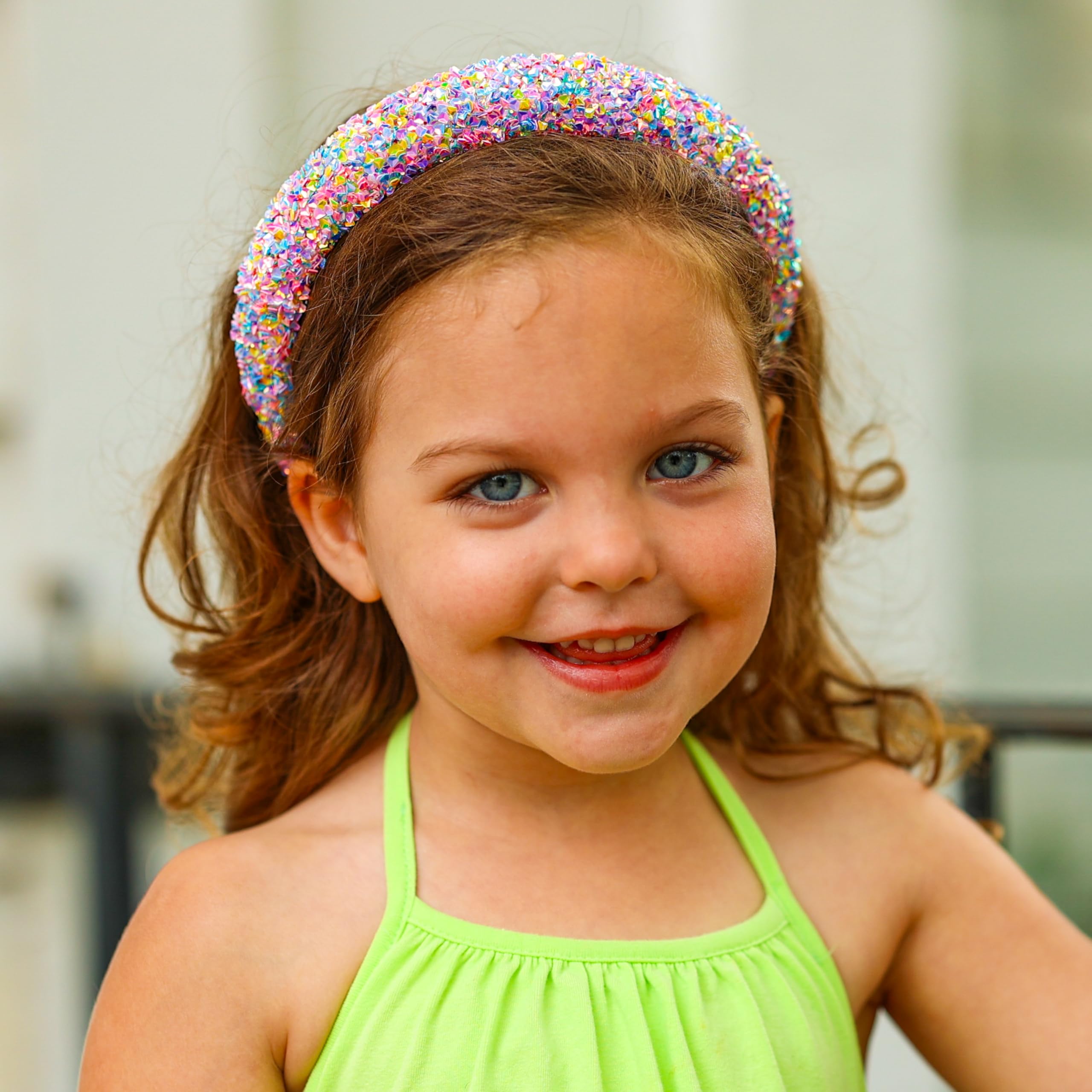 FROG SAC Headband on child image demonstrates cheerful sparkle for everyday wear.
